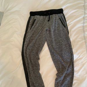 track pants with pleather detail